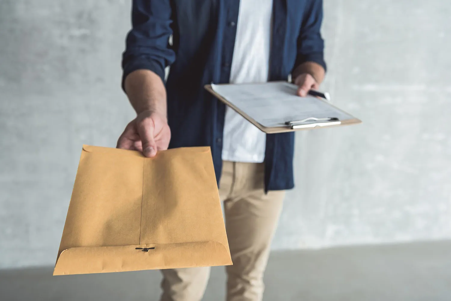 Professional process server delivering legal documents in Tulsa, Oklahoma